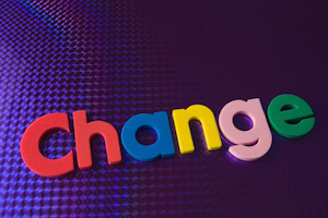 colorful change word on blue neon background